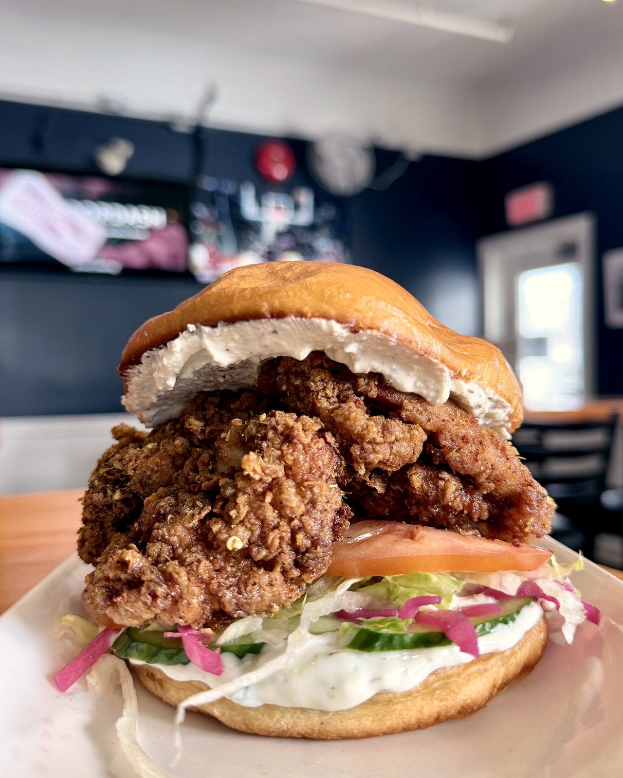Mt Olympus chicken sandwich with buttermilk-fried chicken, tzatziki and pickled onion, OV Burger Bar Prince Rupert